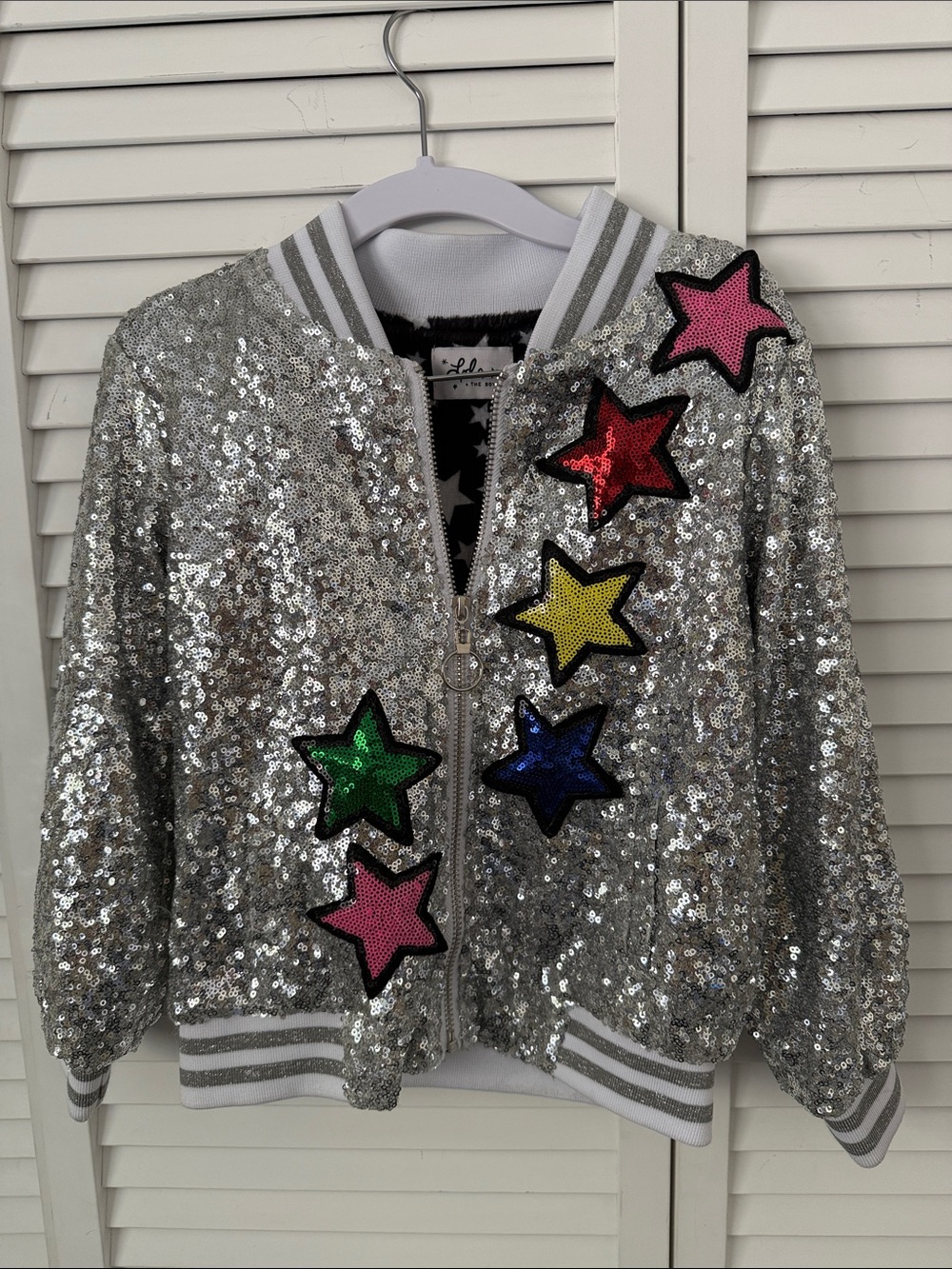 Lola + The Boys Silver Sequin Star Bomber Jacket with Multicolor Stars